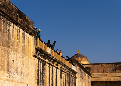 Tourists on Amber Fort rampart, Rajasthan, Amer, India