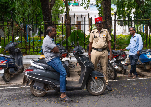 Indian man on a scooter with a policeman, Pondicherry, Puducherry, India