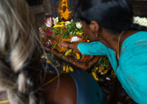 Indian women praying in Sri Ranganathaswamy Temple, Tamil Nadu, Tiruchirappalli, India