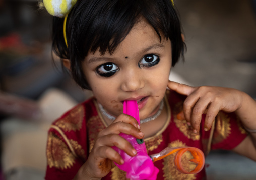 Portrait of little girl with Kohl on the eyes, Rajasthan, Pushkar, India
