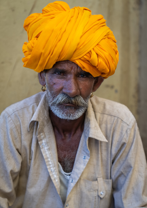 Portrait of a rajasthani man with a yellow turban, Rajasthan, Pushkar, India