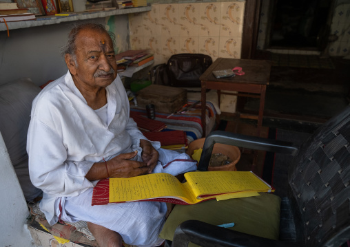 Indian man with his account book, Rajasthan, Ramgarh Shekhawati, India