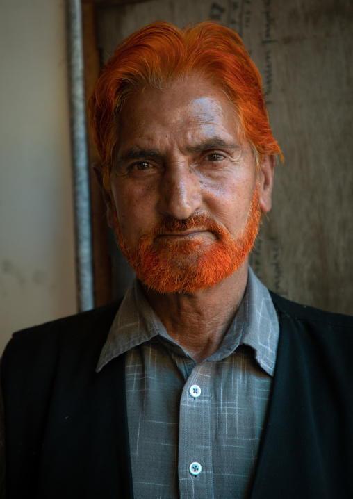 Kashmiri man with red hair and beard dyed with henna, Jammu and Kashmir, Srinagar, India