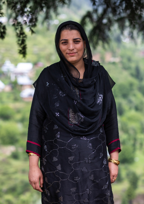Portrait of an indian women dressed in black, Jammu and Kashmir, Kangan, India