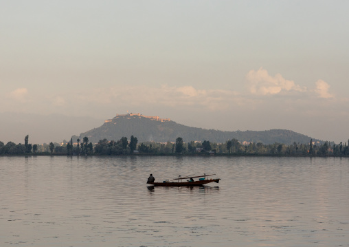Kashmiri fisherman on Dal Lake at morning, Jammu and Kashmir, Srinagar, India