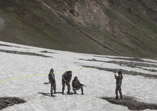 Indian soliders taking pictures in the snow, Ladakh, Zoji La pass, India
