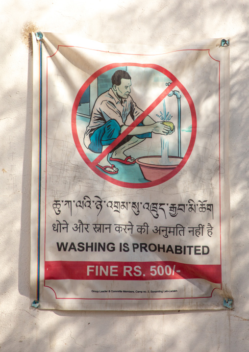 Poster to forbid using water for washing in Tibetan settlement, Ladakh, Leh, India
