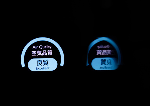 Air pollution sensor measuring air quality in a taxi, Kanto region, Tokyo, Japan