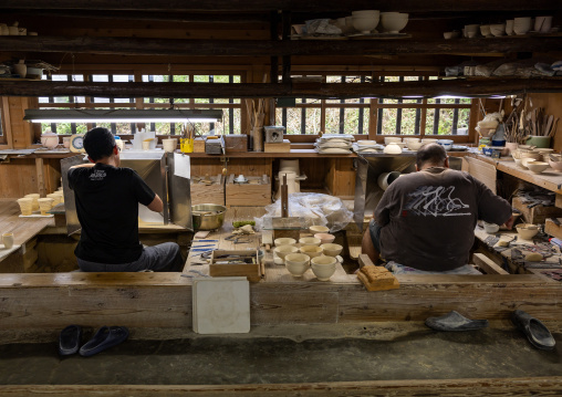 Artisans in Genemongama porcelain atelier, Kyushu region, Arita, Japan