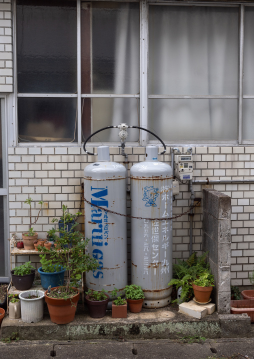 Maruigas gas cylinders for kitchen cooking outside of a house, Kyushu region, Arita, Japan