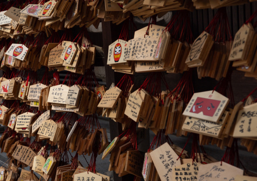 Ema wooden plaques with wishes and prayers at Kushida shrine, Kyushu region, Fukuoka, Japan