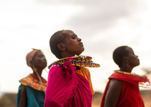 Samburu women dancing with huge necklaces, Samburu County, Samburu National Reserve, Kenya