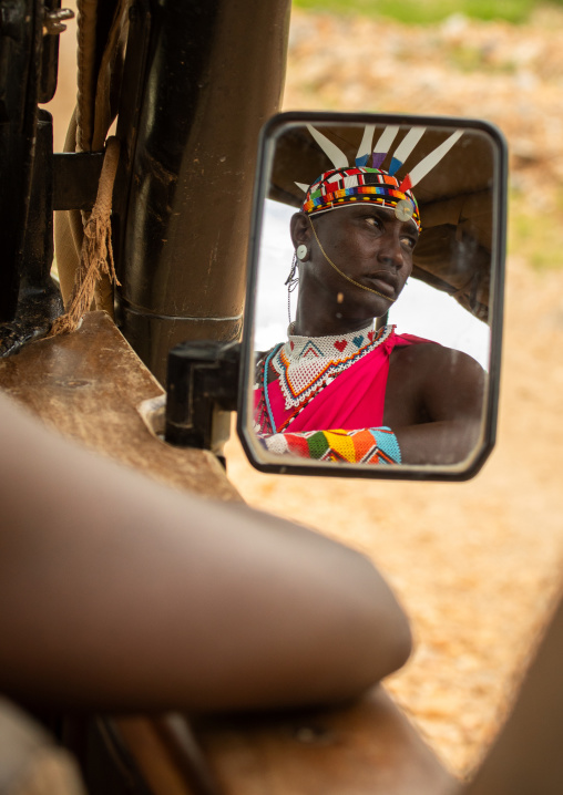Portrait of a samburu moran in a car mirror, Samburu County, Samburu National Reserve, Kenya