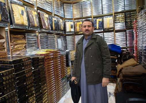 Clothes seller in his shop, Riyadh Province, Riyadh, Saudi Arabia