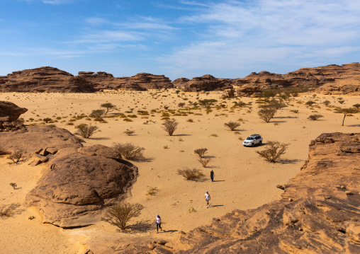 Tourists walking in the desert, Najran Province, Thar, Saudi Arabia