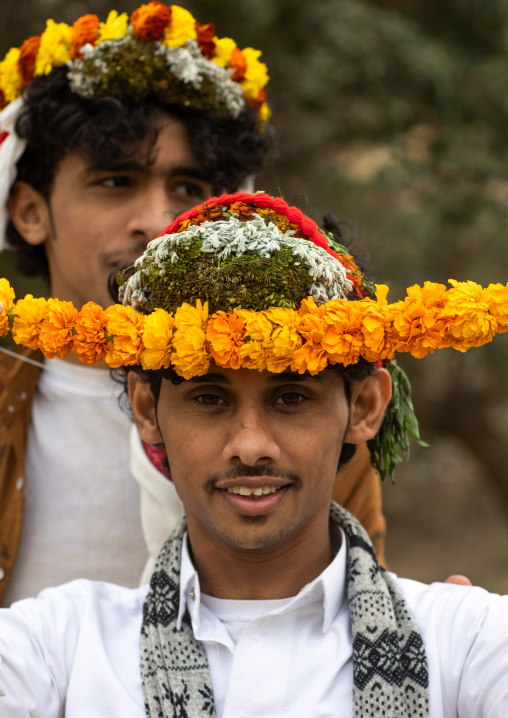 Portrait of flower men wearing  floral crowns, Asir province, Sarat Abidah, Saudi Arabia