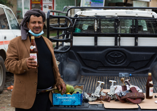 Saudi man selling honey in a market, Jazan province, Addayer, Saudi Arabia