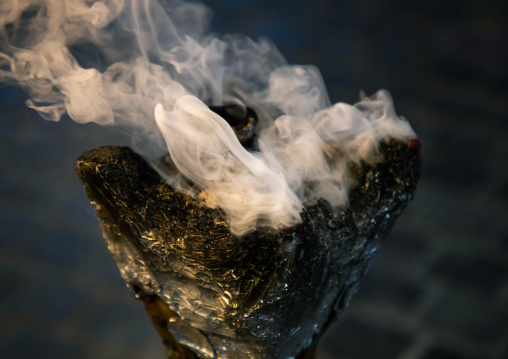 Frankincense smoke in a burner, Mecca province, Jeddah, Saudi Arabia