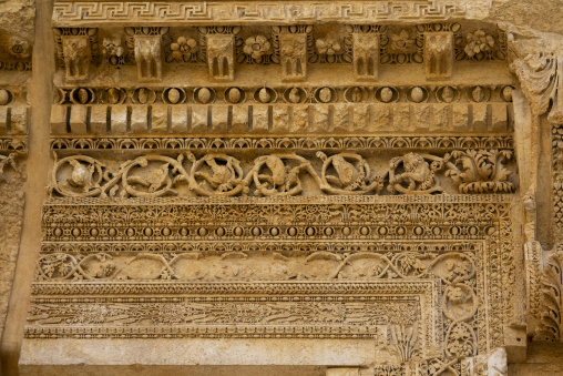 Intricate carved friezes with rosettes and vine scrolls decorate the ancient Roman temple ruins, Baalbek-Hermel Governorate, Baalbek, Lebanon