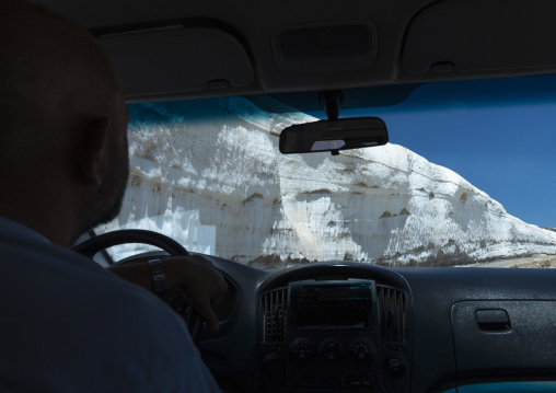 Car driving along snow in the mountain, North Governorate, Daher el Kadib, Lebanon