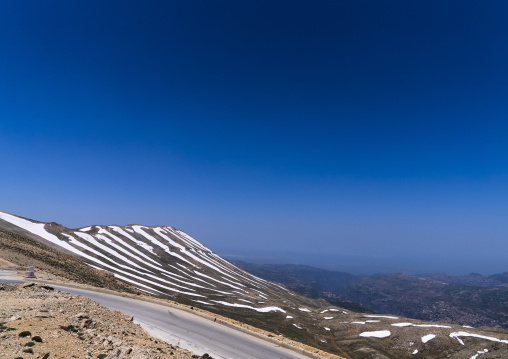 Road in the mountain with patches of snow, North Governorate, Daher el Kadib, Lebanon