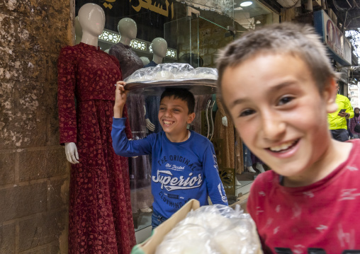 Young syrian boys working in the souk, North Governorate, Tripoli, Lebanon