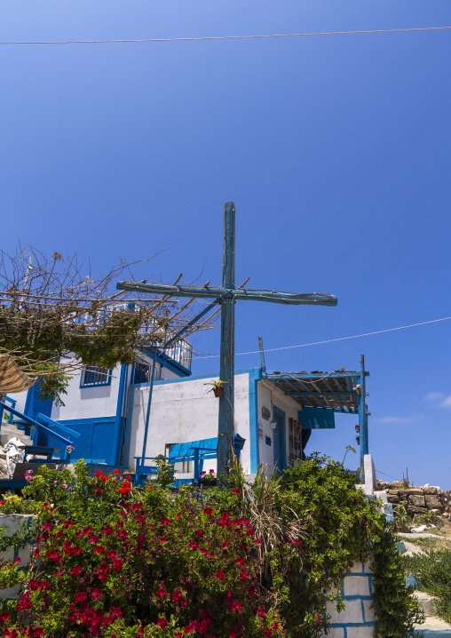 Cross in front of a restaurant, North Governorate, Anfeh, Lebanon