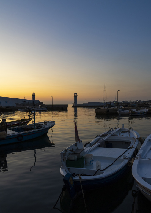 Fishing boats in the harbor in the sunset, North Governorate, Batroun, Lebanon
