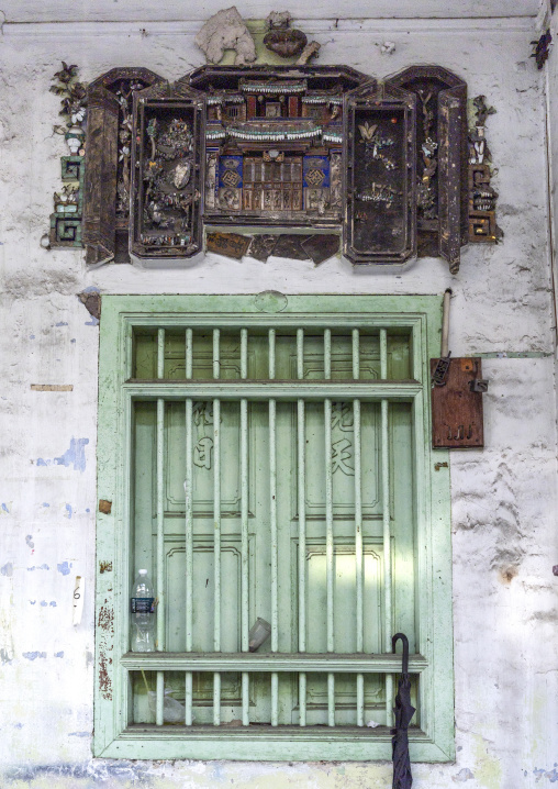 Old house window in the Unesco World Heritage old town, Penang island, George Town, Malaysia