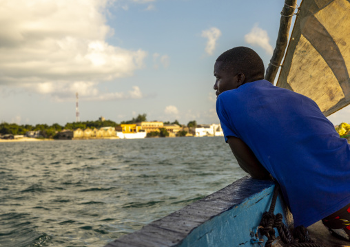 Man sailing on a dhow, Nampula Province, Island of Mozambique, Mozambique