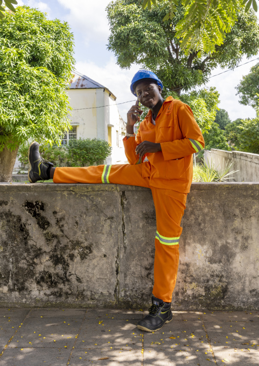 Worker calling on his mobile phone in the street, Inhambane Province, Inhambane, Mozambique