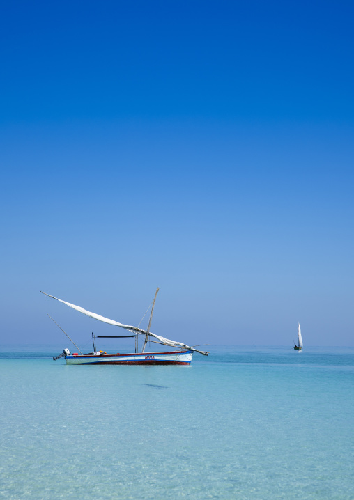Dhow on turquoise water, Nampula Province, Island of Mozambique, Mozambique