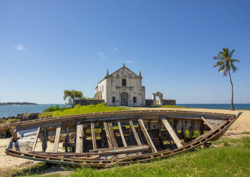 Boat in front of the Chapel of Santo Antonio, Nampula Province, Island of Mozambique, Mozambique