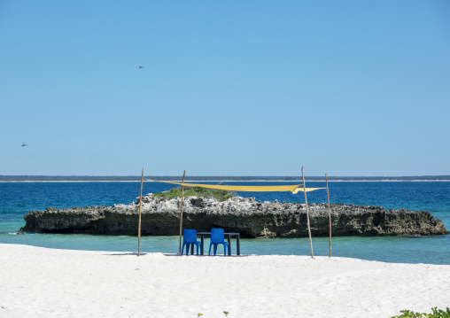 White sand beach with shade sail, Bazaruto archipelago, Santa Carolina island, Mozambique