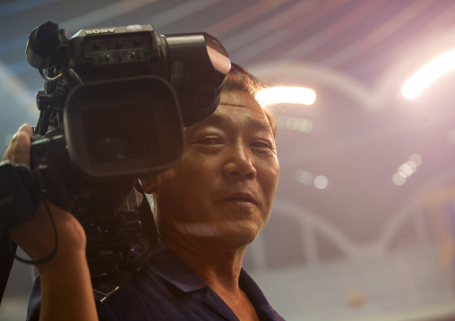 Portrait of a North Korean television cameraman in Arirang, DGC, Pyongyang, North Korea