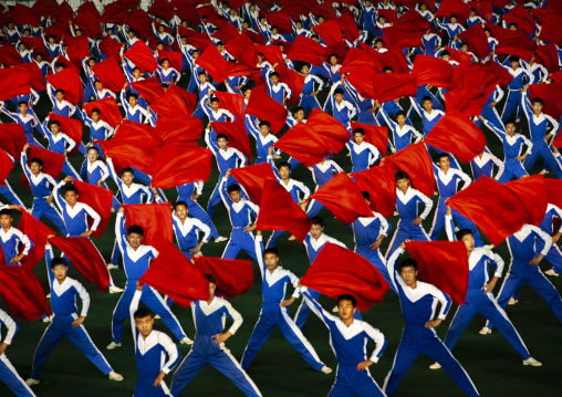 North Korean gymnasts with red flags during the Arirang mass games, DGC, Pyongyang, North Korea