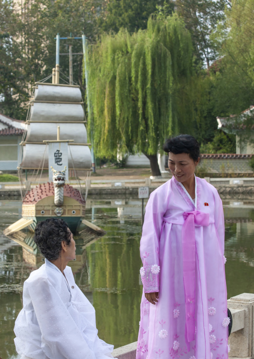 North korean women near a lake, North Hwanghae, Sariwon, North Korea