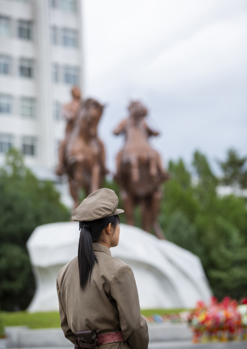 Side view of a North Korean young female guard, DGC, Pyongyang, North Korea