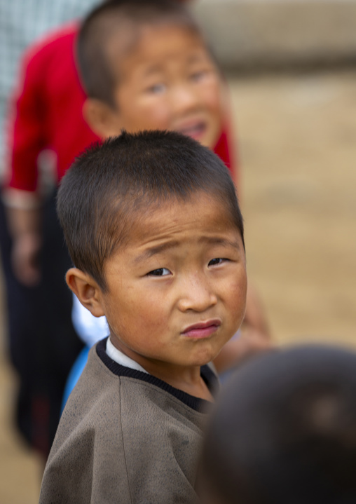 North Korean children making morning gymnastics at school, South Hamgyong, Hamhung, North Korea