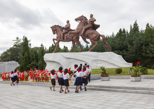 North Korean pioneers paying respect to the Leaders in Mansudae art studio, DGC, Pyongyang, North Korea