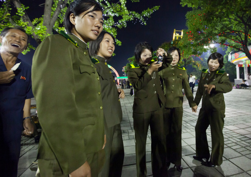 North Korean women soldiers taking pictures, DGC, Pyongyang, North Korea