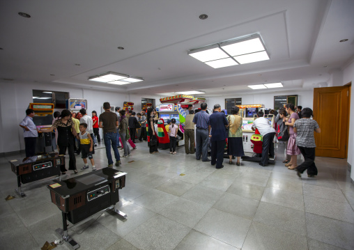 North Korean people playing video games in Kaeson youth park, DGC, Pyongyang, North Korea