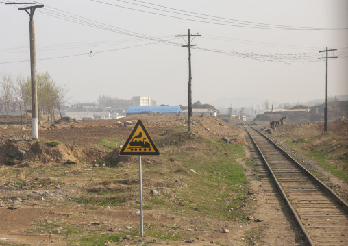 Warning sign in front of a railway, South Pyongan, Nampo, North Korea