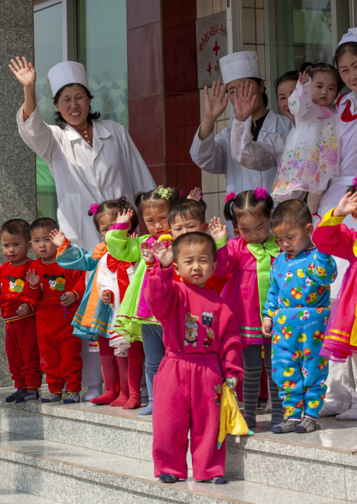 North Korean children in an orphanage with a nurse, South Pyongan, Nampo, North Korea