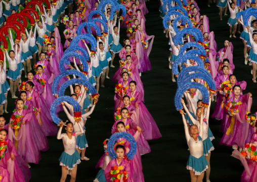 Women dancing in choson-ot during the Arirang mass games, DGC, Pyongyang, North Korea