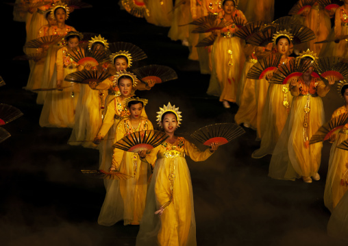 Women dancing in choson-ot during the Arirang mass games, DGC, Pyongyang, North Korea