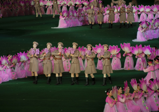 North Korean women dressed as soldiers dancing during Arirang, DGC, Pyongyang, North Korea
