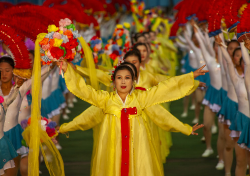 Women dancing in choson-ot during the Arirang mass games, DGC, Pyongyang, North Korea