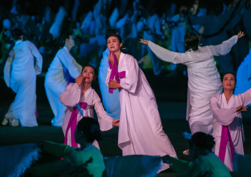 Women dancing in choson-ot during the Arirang mass games, DGC, Pyongyang, North Korea