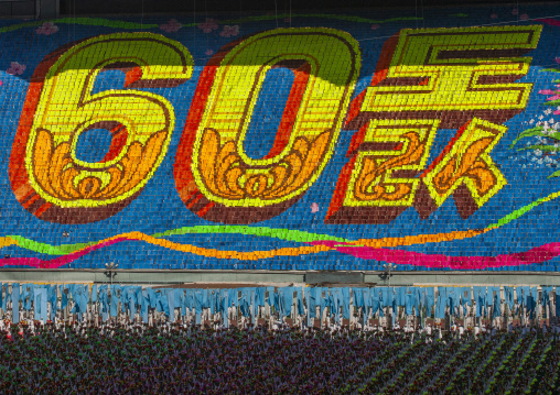 Children pixels holding up colored boards during Arirang mass games, DGC, Pyongyang, North Korea